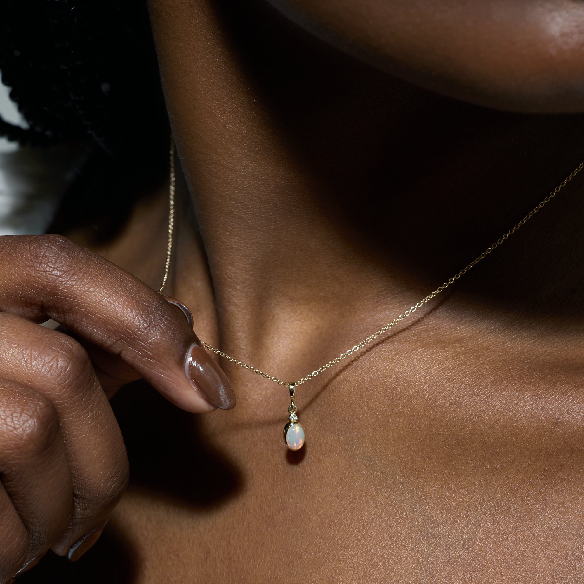 Ethiopian Opal & .015 CT Diamond 16-18